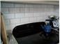 Glenn Reed Tiling Services-splash back behind cooker in cowfold